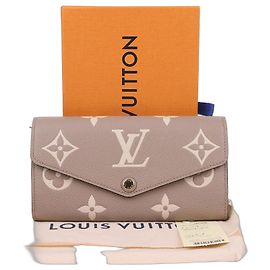 Louis Vuitton Portefeuille Sarah à monogramme beige Marron