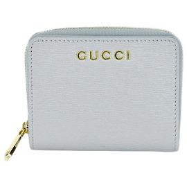 Gucci Portafoglio bi-fold con logo script Argento