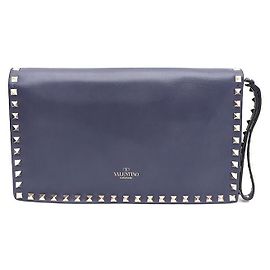 Valentino Clutch Rockstud com aba em dourado Azul