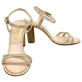 Sandali Chanel in pitone Arancione