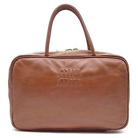 Miu Miu Embossed Logo Bowling Bag Brown
