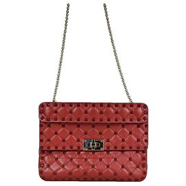 Valentino Bolsa de mão com alça superior, transversal e de ombro com spikes Vermelho