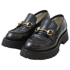 Gucci Mocassins de couro com sola tratorada preta Preto