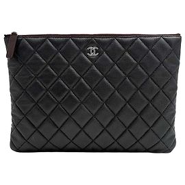 Chanel Caviar Clutch New Medium Black