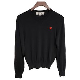 Comme Des Garcons Schwarzer Strick für Damen mit rotem Mini-Patch Schwarz