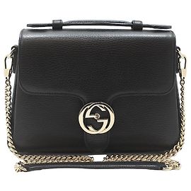 Gucci Bolsa de mão e de ombro com corrente e alça superior entrelazada em couro preto Preto