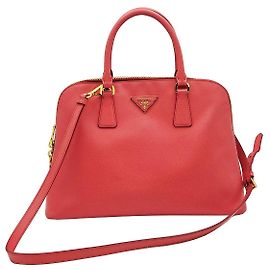 Prada Bolsa Dome em Saffiano rosa com logotipo de triângulo dourado Rosa