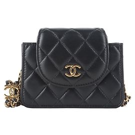 Chanel Mini bolsa tiracolo de aba clássica em pele de cordeiro com corrente dupla dourada Preto