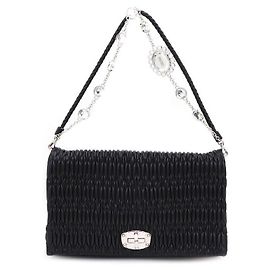 Miu Miu Bolsa de mão e bolsa de ombro em nappa matelassé com corrente de cristal Preto
