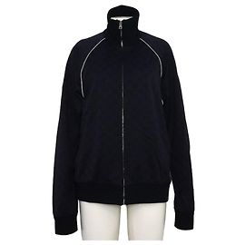 Gucci Giacca con zip a collo alto da uomo in jacquard con logo GG blu navy Blu