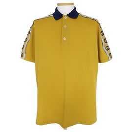 Gucci Poloshirt aus Baumwolle mit GG-Streifendetail Golden