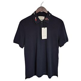 Gucci Polo a maniche corte da uomo con multi-ricamo Blu Navy Blu