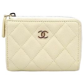 Chanel Nova carteira de aba com zíper em caviar dourado champagne Dourado
