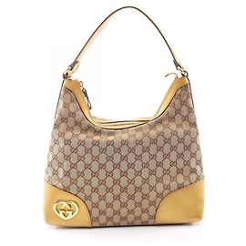 Bolsa de Ombro Gucci Lovely GG Canvas Bege