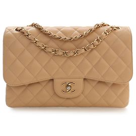 Chanel Beige Jumbo Classic Caviar Double Flap Beige