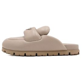 Prada Mules de pele nappa macias acolchoadas bege para mulher Marrom