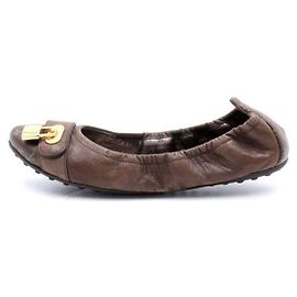 Louis Vuitton Sapatilhas Monogram Lock para mulher Marrom