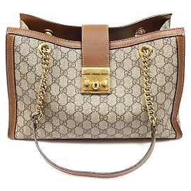 Gucci Bolsa de ombro GG Medium em couro e lona marrom Marrom