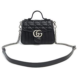 Gucci Mini bolsa transversal GG Marmont em couro matelassê Preto Preto