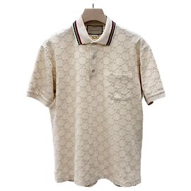 Gucci Polo aus Baumwoll-Piqué mit GG-Logo Elfenbein Weiß