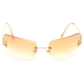 Chanel Óculos de sol sem armação com logotipo CC em cristal dourado Dourado