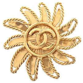 Spilla fiore logo Coco di Chanel D'oro