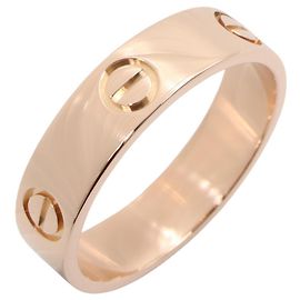 Bague Love de Cartier en or rose 18K Doré