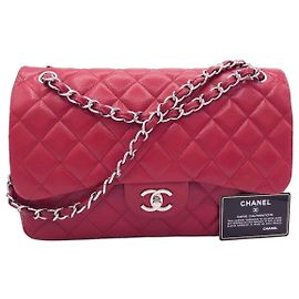 Sac à double rabat classique Chanel Jumbo en cuir caviar rouge Rouge