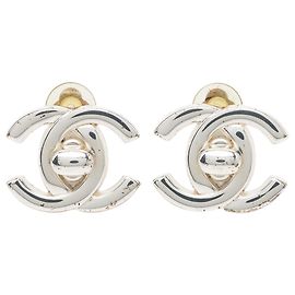 Chanel Clip-Ohrringe Silber CC Messing mit Turn Lock Verschluss Silber
