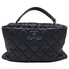 Borsa a tracolla Chanel Portobello in tweed e pelle trapuntata Nero