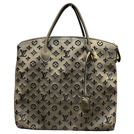 Bolsa de mão vertical Louis Vuitton Lockit Marrom Preto