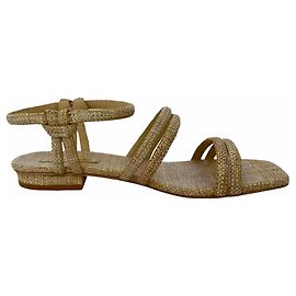 Cult Gaia Ankle Strap Flat Sandals in Beige Raffia Beige