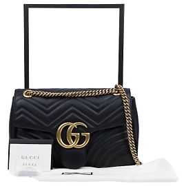 Gucci Bolsa de ombro GG Marmont Matelassé em couro Medium com corrente Preto Preto
