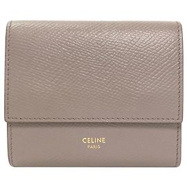 Céline Cartera trifold Celine en piel de becerro grisácea Gris