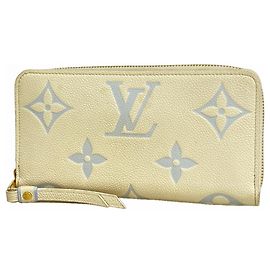 Cartera Zippy Monogram Empreinte Bicolor Louis Vuitton Blanco