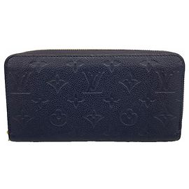 Cartera Zippy Monogram Empreinte Louis Vuitton Roja