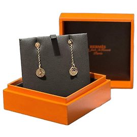 Orecchini Hermès Gambade Clou de Selle in oro rosa e diamanti D'oro