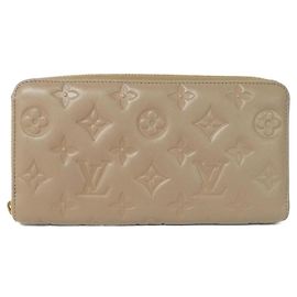 Cartera larga Louis Vuitton Coussin Zippy de piel de cordero Beige Gris pardo