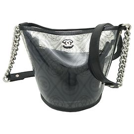 Borsa a tracolla a secchiello Chanel Camellia da donna Nero