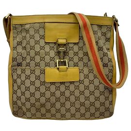 Gucci Bolsa de ombro GG Supreme e couro amarelo Marrom Bege Amarelo