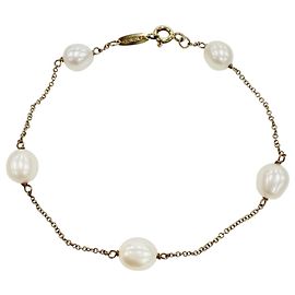 Pulseira de berloques em ouro amarelo com pérola Tiffany & Co. Dourado