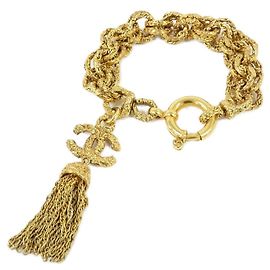 Bracelet à breloques Chanel en or Doré