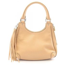 Bolsa Chanel bege em couro caviar Bege