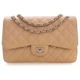 Chanel Beige Jumbo Classic Caviar Double Flap Beige