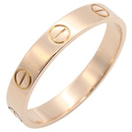Bague Mini Love de Cartier en or rose 18K Doré