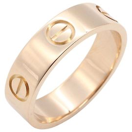 Bague Love de Cartier en or rose 18K Doré