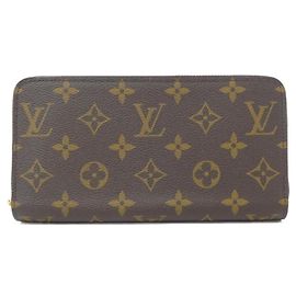 Cartera Zippy Monogram Louis Vuitton Castaño Fucsia