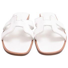 Sandali Oran Logo in pelle bianca Hermès Bianco