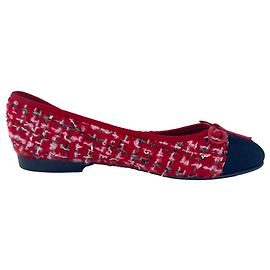Sapatilhas Chanel com logótipo Interlocking CC em tweed rosa Rosa