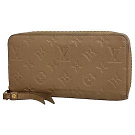 Cartera Zippy Monogram Empreinte Louis Vuitton Gris pardo